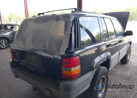 1997 Jeep Grand Cherokee Laredo/Tsi из США, поврежденный, VIN 1J4GZ58SXVC672056
